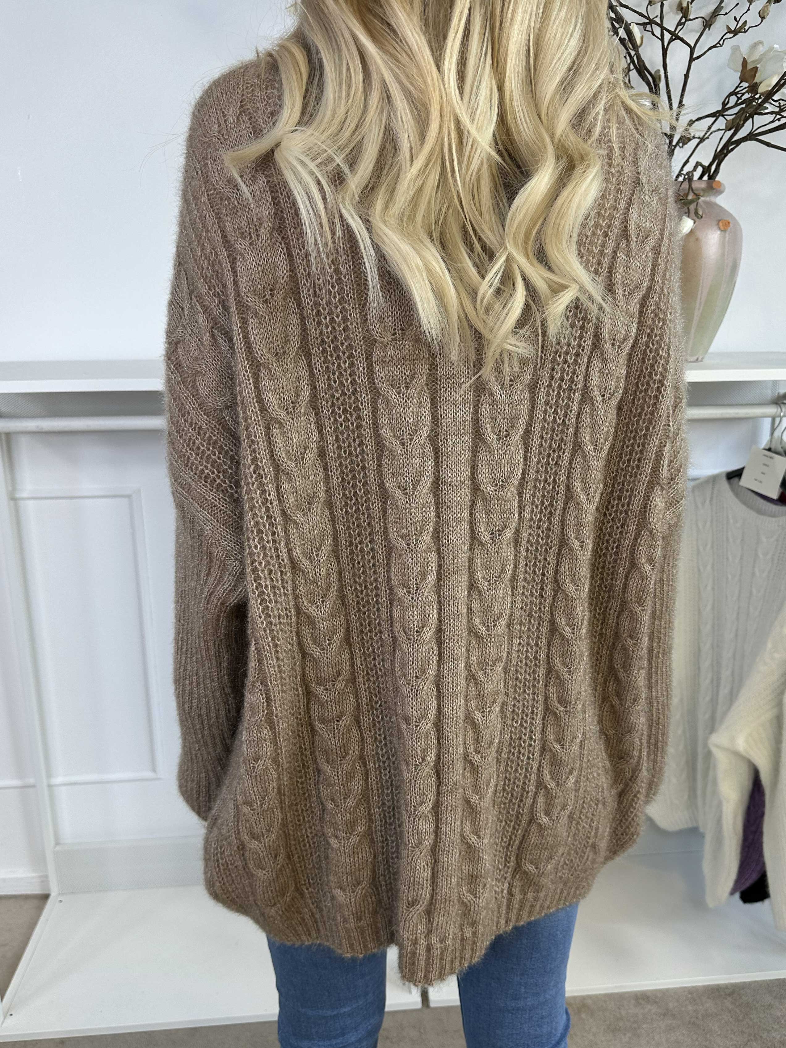 Johanna - Stickad blus i glansig trikå